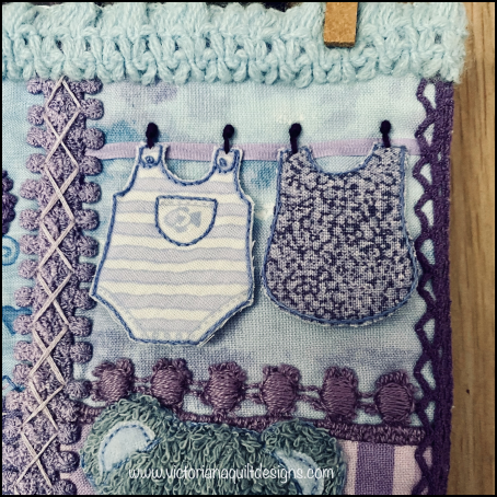 Let's Play April  Close Up of Baby Clothes on a Clothesline