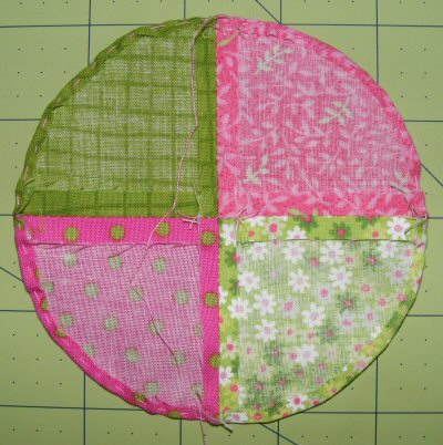 Stitch the seam allowance down around the circle